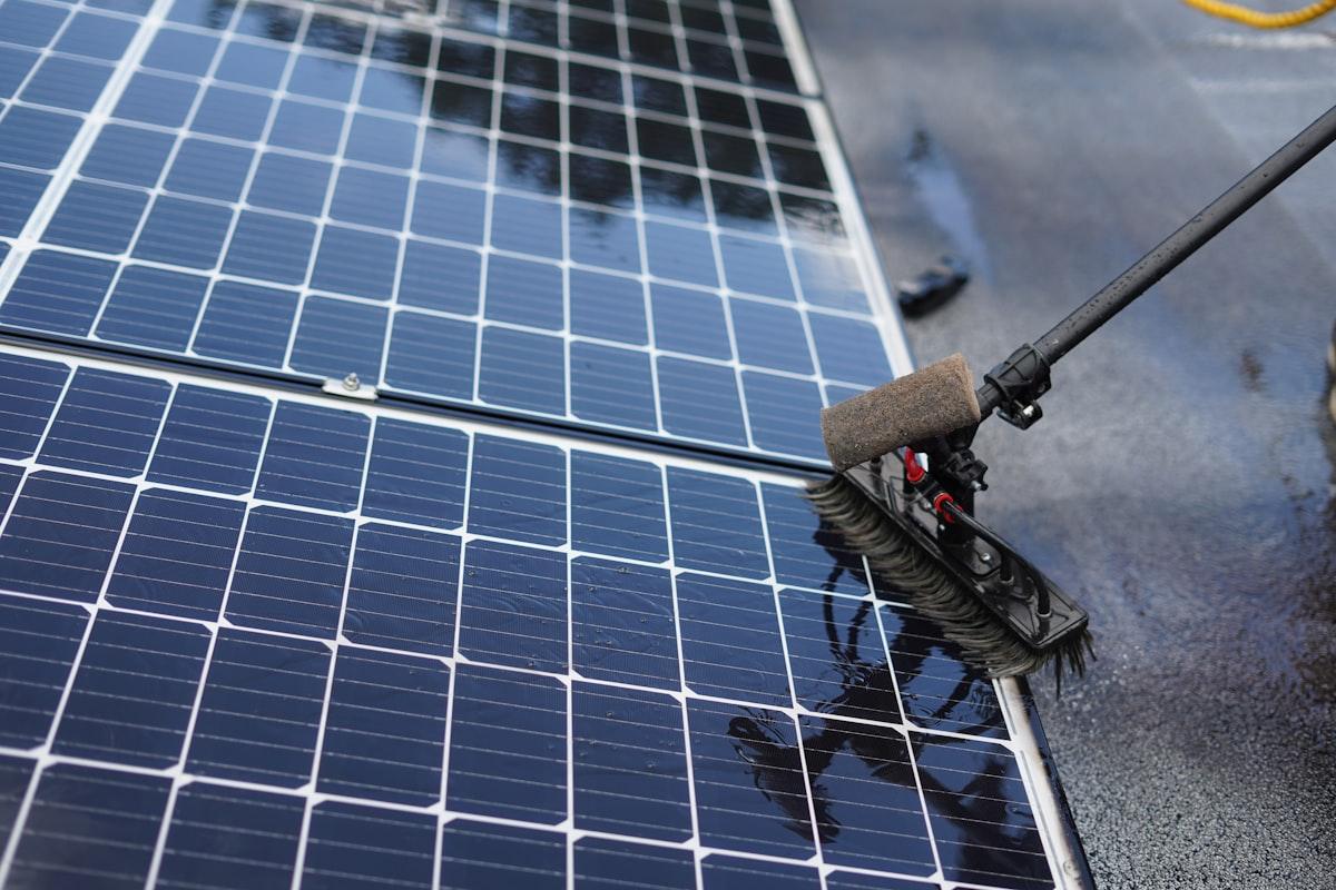 Cleaning solar panels during scheduled maintenance